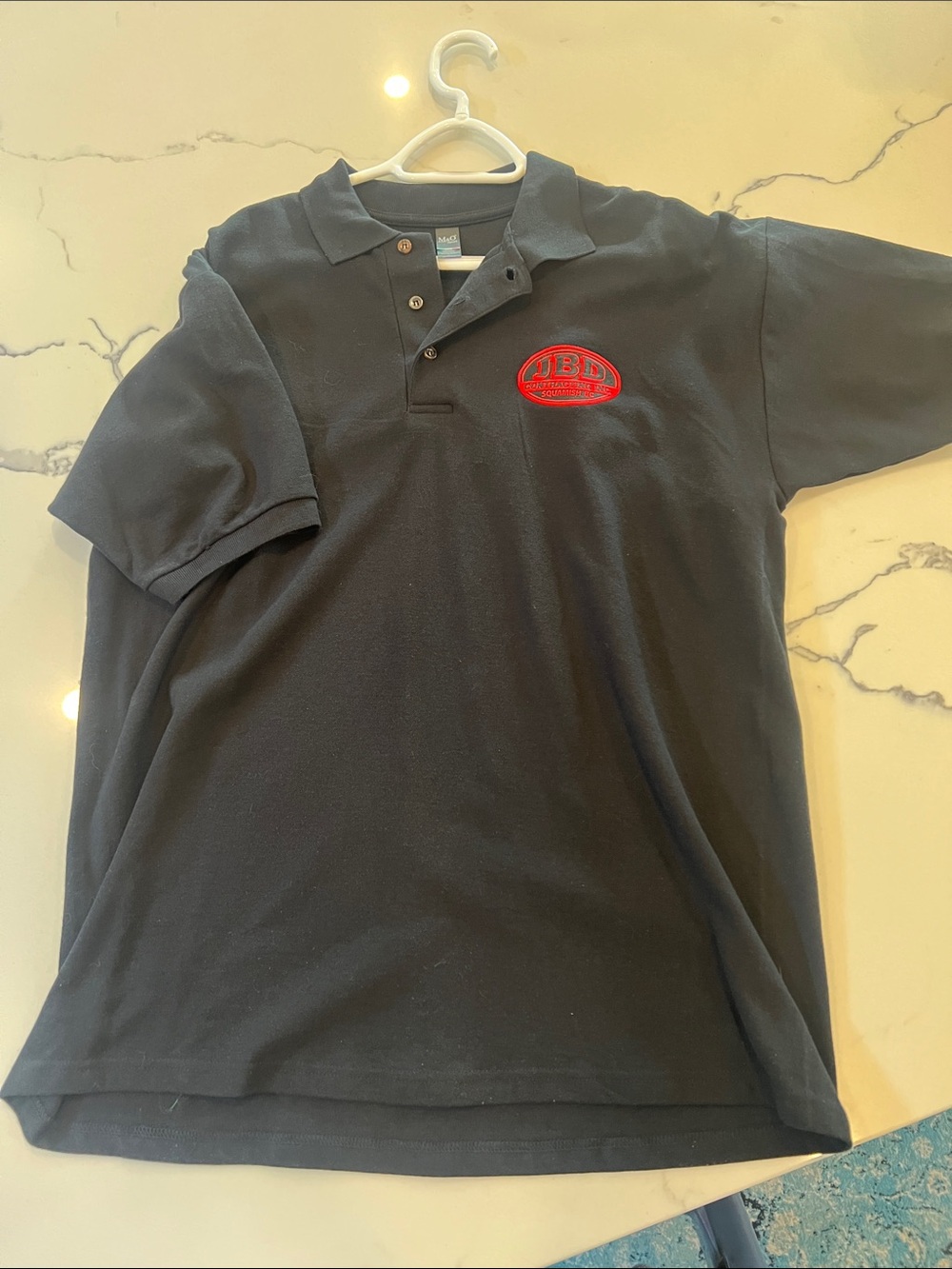 Men's Black Polo Shirt with Red Logo